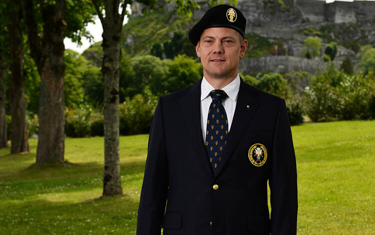 A member of the Knights of Columbus is shown sporting the Knights new uniform.