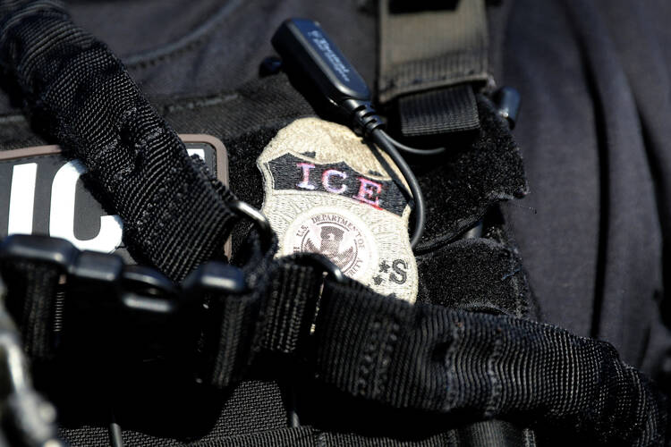 The badge of a U.S. Immigration and Customs Enforcement officer in Santa Ana, Calif., in May 2017. (CNS photo/Lucy Nicholson, Reuters)