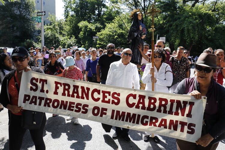 A procession for immigrant rights on July 13 in the streets surrounding St. Frances Xavier Cabrini Shrine in New York City. (CNS photo/Gregory A. Shemitz) 