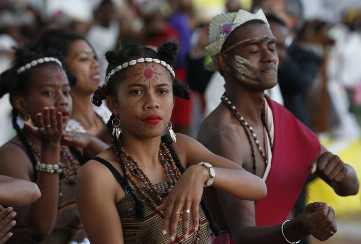  Dancers perform before Pope Francis leads a vigil with young people at the Soamandrakizay diocesan field in Antananarivo, Madagascar, Sept. 7, 2019. (CNS photo/Paul Haring)