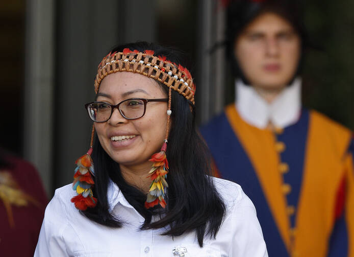 Leah Rose Casimero, an indigenous representative from Guyana, leaves the first session of the Synod of Bishops for the Amazon at the Vatican on Oct. 7, 2019. (CNS photo/Paul Haring)