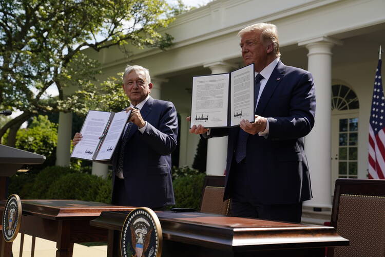 President Donald Trump greets Mexican President Andres Manuel Lopez Obrador at the White House in Washington, Wednesday, July 8, 2020. (AP Photo/Patrick Semansky)