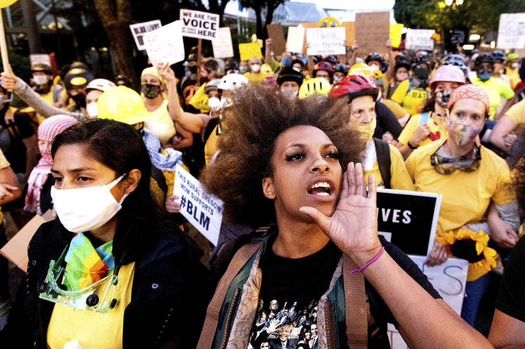 A Black Lives Matter protest on Thursday, July 23, in Portland, Ore. (AP Photo/Noah Berger)