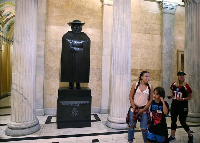 A sculpture of St. Damien of Molokai is seen at the U.S. Capitol in Washington in this 2017 file photo. (CNS photo/Tyler Orsburn)
