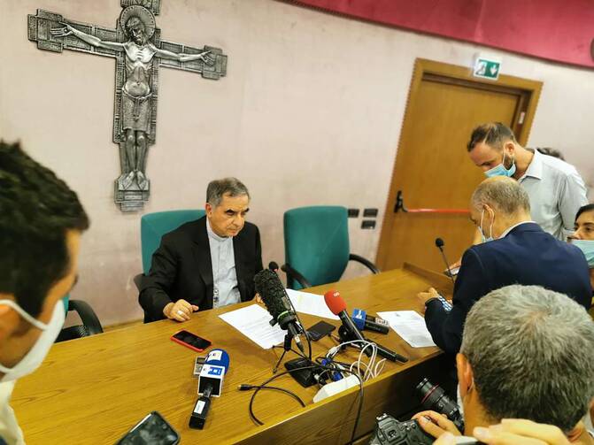 Cardinal Angelo Becciu speaks with journalists during a media conference in Rome Sept. 25, 2020. The cardinal told journalists he was asked by Pope Francis Sept. 24 to resign as prefect of the Congregation for Saints' Causes and renounce the rights associated with being a cardinal due to an embezzlement investigation involving Vatican funds and a charitable organization run by his brother. (CNS photo/Junno Arocho Esteves)