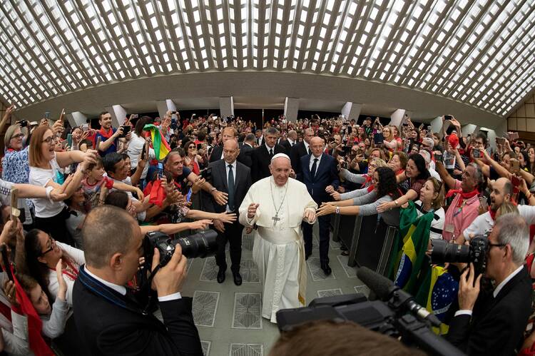 Pope Francis arrives for an audience with members of the Catholic Charismatic Renewal International Service in Paul VI hall at the Vatican June 8, 2019. (CNS photo/Vatican Media handout via Reuters) 