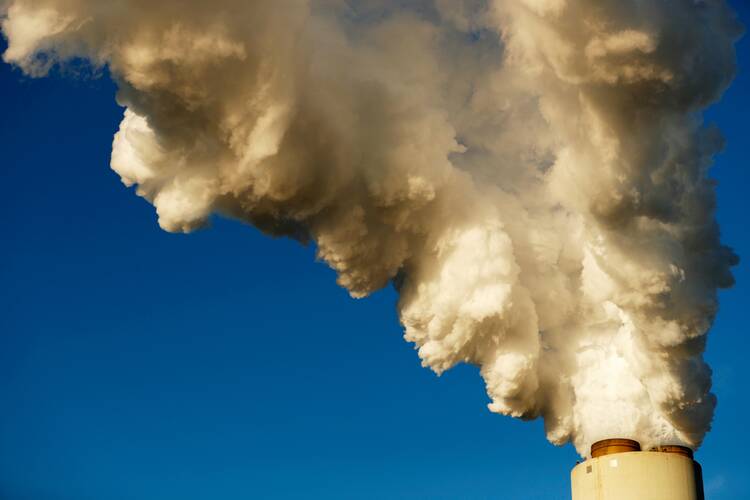 Smoke rises from Duke Energy's Marshall Steam Station in Sherrills Ford, N.C., Nov. 29, 2018. Governments have an unprecedented "moral duty" to take urgent action to combat climate change, Catholic development agencies said before the U.N. Climate Change Summit in 2019. (CNS photo/Chris Keane, Reuters)