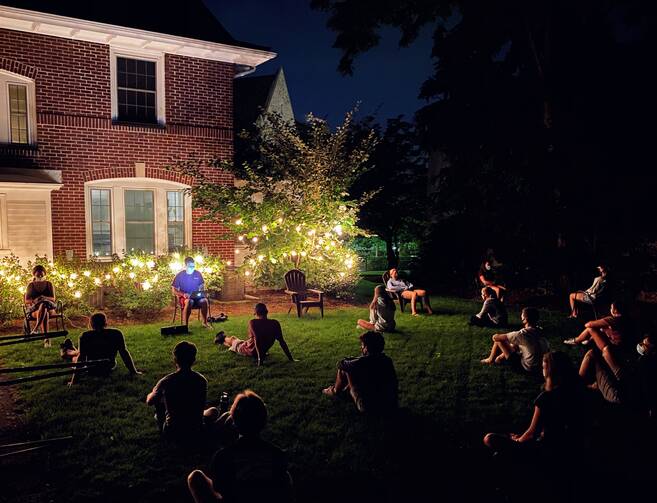 Students at Boston College pray the Examen, while wearing masks and engaging in social distancing. (Photo courtesy of Joseph Vecchio and Emily Egan)