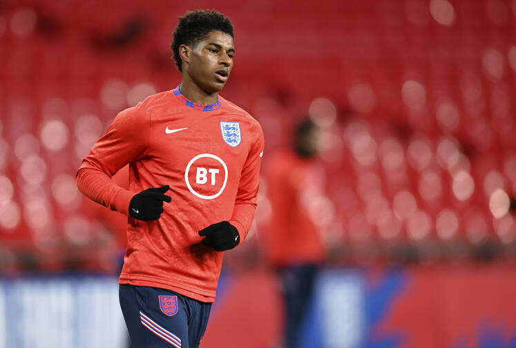 England's Marcus Rashford warms up ahead of their UEFA Nations League soccer match against Denmark at Wembley Stadium in London on Oct. 14. (Daniel Leal-Olivas/Pool via AP, file)