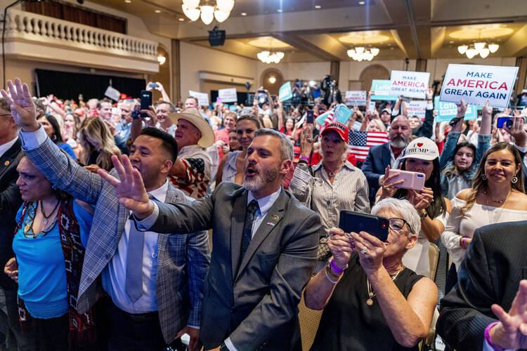 The Latinos for Trump Coalition welcomes President Trump on Sept. 14 at the Arizona Grand Resort & Spa in Phoenix. (AP Photo/Andrew Harnik)