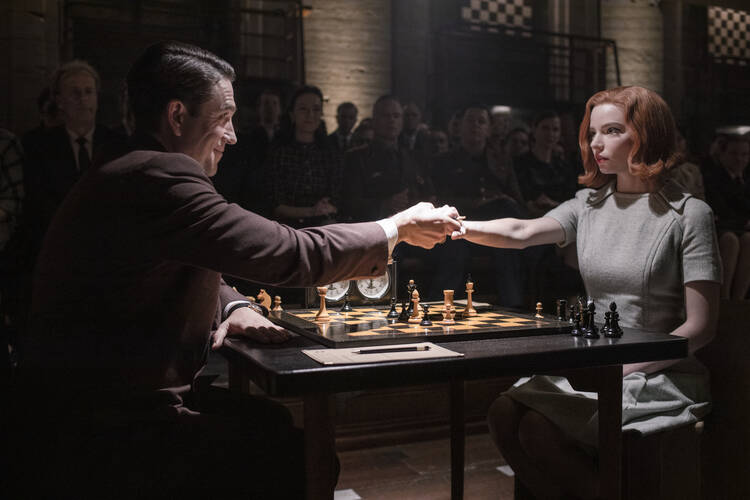 Marcin Dorocinski as Vasily Borgov and Anya Taylor-joy as Beth Harmon in “The Queen’s Gambit” (Phil Bray/Netflix). 