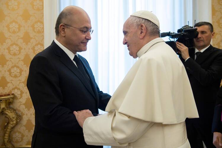  Pope Francis greets Iraqi President Barham Salih at the Vatican Jan. 25, 2020. The Vatican has confirmed Pope Francis will visit Iraq March 5-8. (CNS photo/Vatican Media)