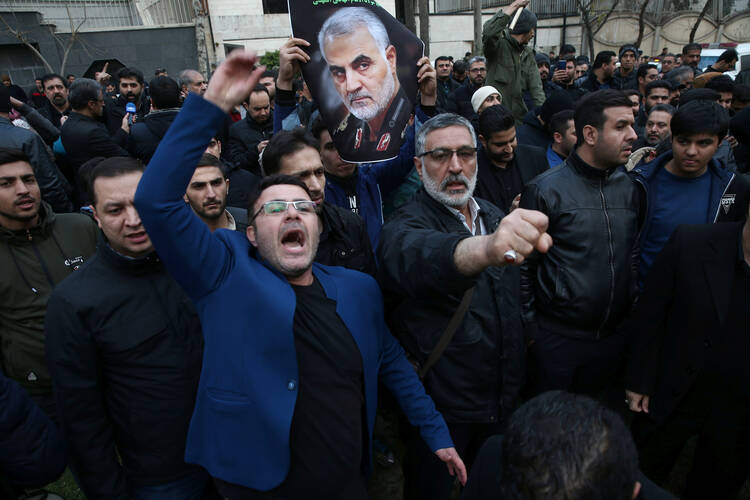 Demonstrators react during a Jan. 3, 2020, protest in front of U.N. offices in Tehran, Iran, after Iranian Maj. Gen. Qassem Soleimani was killed in a U.S. drone airstrike at Baghdad International Airport earlier that day. (CNS photo/Nazanin Tabatabaee, West Asia News Agency via Reuters) 