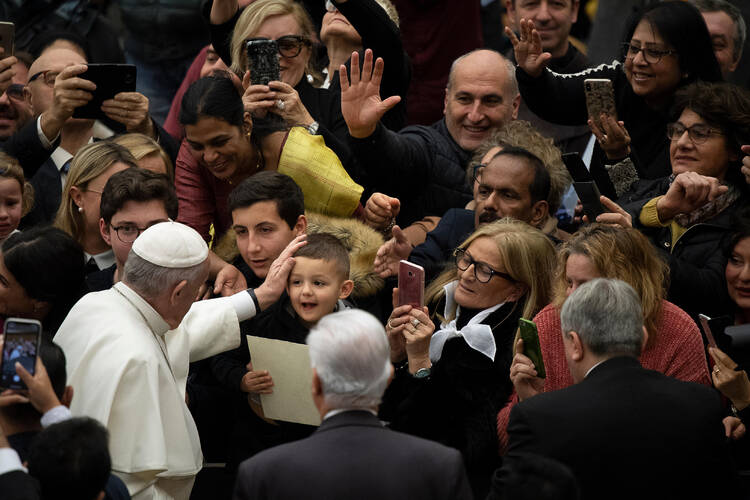 Pope Francis arrives for his general audience in Paul VI hall at the Vatican Jan. 22, 2020.