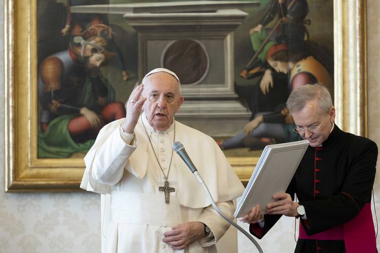 Pope Francis speaks during his general audience as it is livestreamed from the library of the Apostolic Palace at the Vatican March 18, 2020. (CNS photo/Vatican Media)
