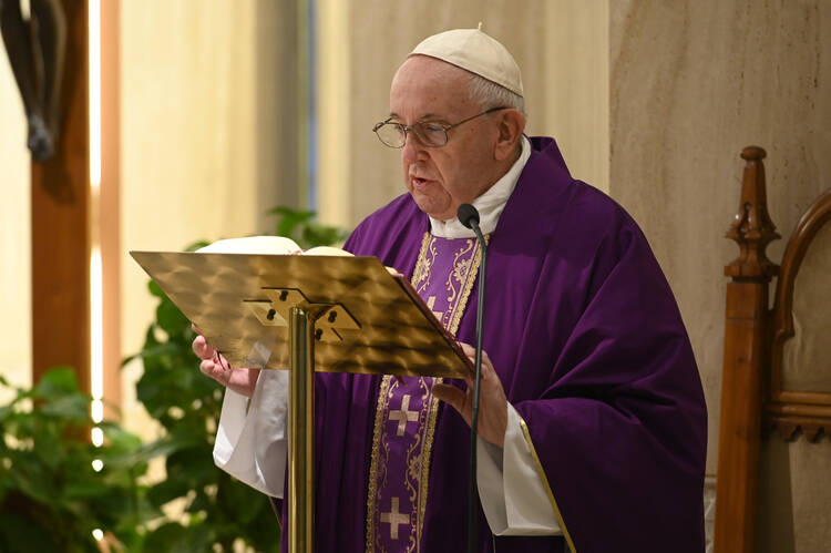 Pope Francis celebrates Mass in the chapel of his Vatican residence, the Domus Sanctae Marthae, April 1, 2020. The pope thanked journalists and members of the media "who work to communicate so that people don't find themselves so isolated." (CNS photo/Vatican Media) 