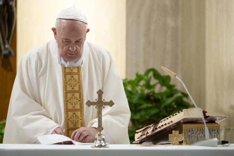 Pope Francis celebrates Mass on April 17, 2020, in the chapel of his Vatican residence, the Domus Sanctae Marthae. (CNS photo/Vatican Media)