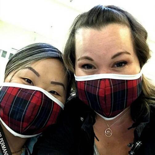 Medical workers from Kaiser Permanente in Oregon wear donated coronavirus masks made by Dennis Uniform. The Portland company makes school uniforms for 2,500 private and Catholic schools throughout the U.S. (CNS photo/courtesy Dennis Uniform) 