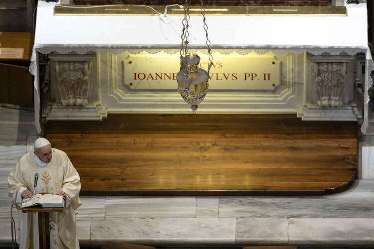 Pope Francis gives the homily at Mass at the tomb of St. John Paul II in St. Peter's Basilica May 18, 2020, the 100th anniversary of the late pope's birth. (CNS photo/Vatican Media) 