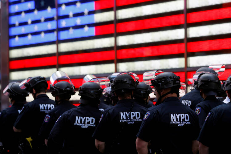 New York City police officers in Times Square on June 1. (CNS photo/Mike Segar, Reuters) 