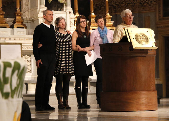 Elizabeth McAlister, right, is seen in this 2016 file photo at the Church of St. Francis Xavier in New York City's Chelsea neighborhood. (CNS photo/Gregory A. Shemitz)