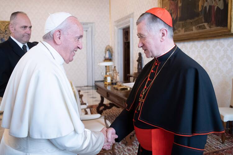 Pope Francis greets Cardinal Blase J. Cupich of Chicago during a meeting with U.S. bishops from Illinois, Indiana, and Wisconsin making their "ad limina" visits to the Vatican Dec. 12, 2019. (CNS photo/Vatican Media) 