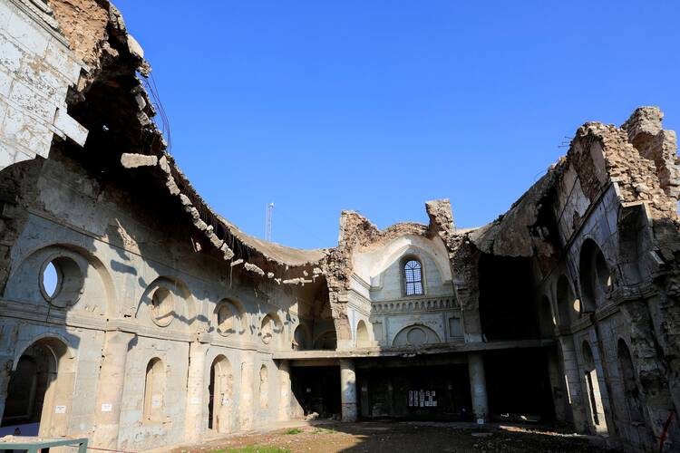 The destroyed Al-Tahera Syriac Catholic Church is seen in Mosul, Iraq, on Feb. 22, 2021. The church was bombarded during the airstrike campaign that drove the Islamic State out of Mosul. (CNS photo/Thaier al-Sudani, Reuters)