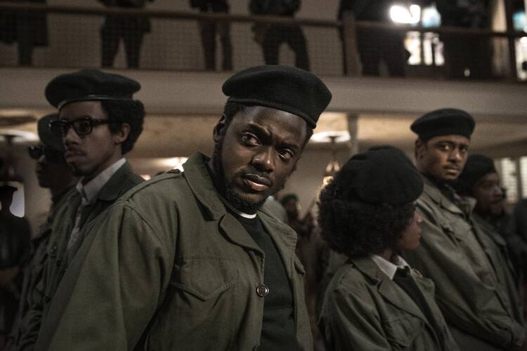 Daniel Kaluuya, center, in “Judas and the Black Messiah.” (CNS photo/Glen Wilson, Warner Bros.)