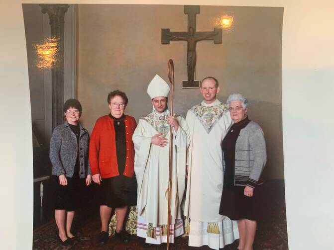 The author on his ordination day. Mary Stephen Healey, R.D.C., is pictured at right.