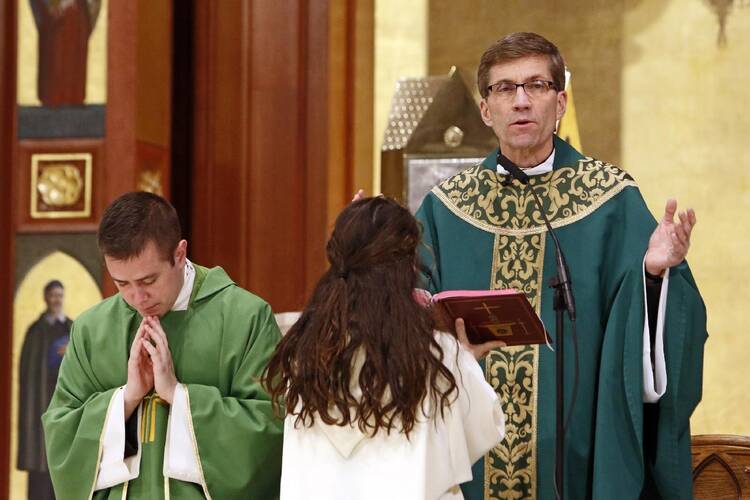 Msgr. William Koenig, vicar for clergy for the Diocese of Rockville Centre, N.Y., is seen celebrating Mass at St. Agnes Cathedral in Rockville Centre Jan. 27, 2019. Pope Francis appointed him bishop of the Diocese of Wilmington, Del., April 30, 2021. (CNS photo/Gregory A. Shemitz)