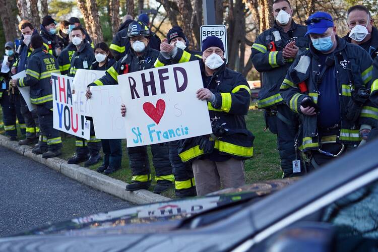 Firefighters participate in an appreciation rally for medical workers at St. Francis Hospital & Heart Center in Roslyn, N.Y., April 9, 2020, during the early stages of the coronavirus pandemic. (CNS photo/Gregory A. Shemitz)