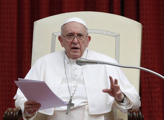 Pope Francis speaks during his general audience in the San Damaso Courtyard of the Apostolic Palace at the Vatican on June 23, 2021. (CNS file photo/Paul Haring)