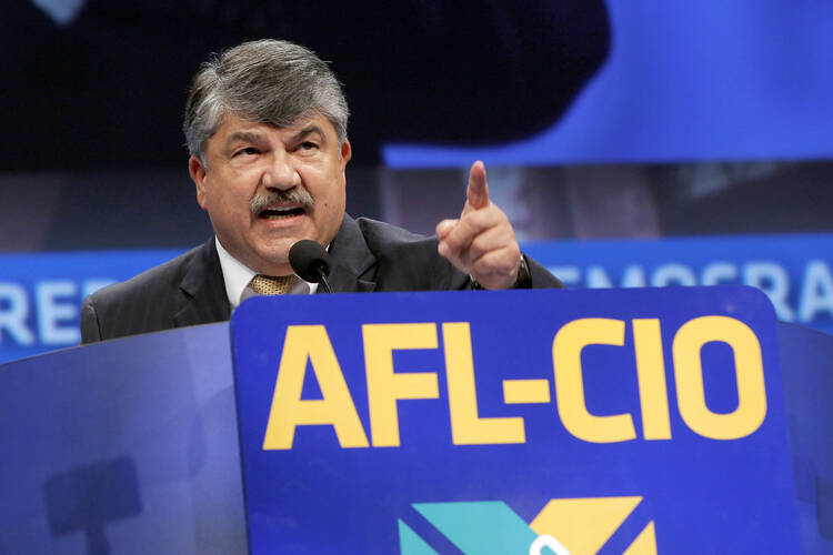 In this Sept. 9, 2013 file photo, Richard Trumka, American Federation of Labor and Congress of Industrial Organizations president, addresses members during the quadrennial AFL-CIO convention at Los Angeles Convention Center in Los Angeles.  (AP Photo/Nick Ut)