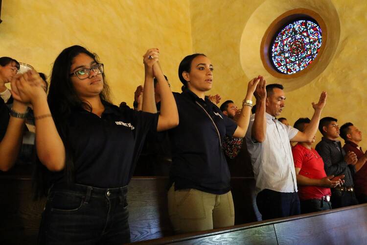Latino Catholics attend Mass at the Labor Day Encuentro gathering at Immaculate Conception Seminary in Huntington, N.Y., on Sept. 3, 2018. (CNS photo/ Gregory A. Shemitz, Long Island Catholic)