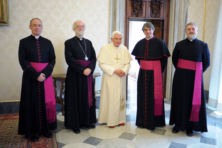 Jonathan Goodall, formerly the Anglican bishop of Ebbsfleet, stands (at right) with Pope Benedict XVI and then-Archbishop of Canterbury Rowan Williams.