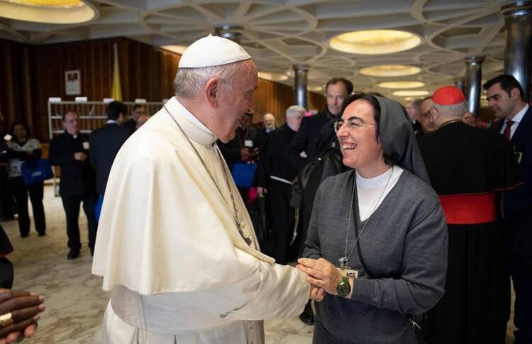 Pope Francis named Salesian Sister Alessandra Smerilli as undersecretary for faith and development at the Dicastery for Promoting Integral Human Development. Sister Smerilli is pictured meeting the pope at the Vatican in an undated photo. (CNS photo/Vatican Media, courtesy Dicastery for Promoting Integral Human Development)