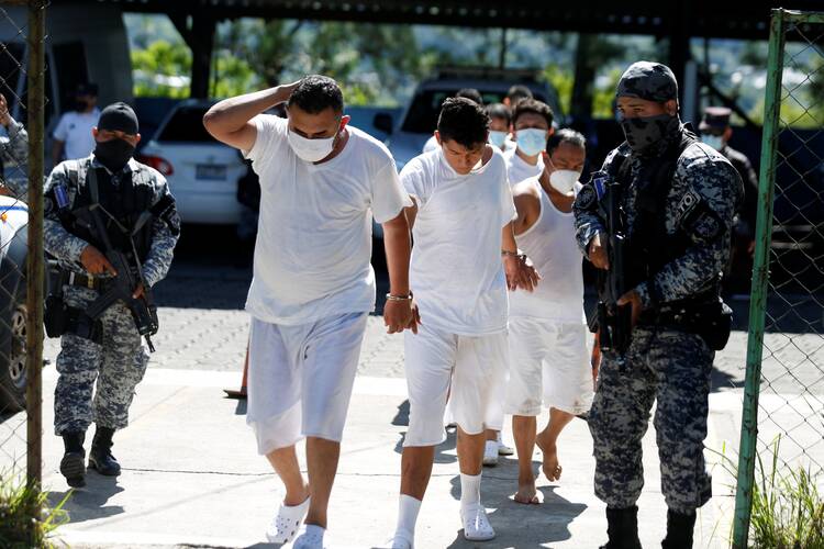 Suspected gang members are presented to the media in San Salvador, El Salvador, in November 2020. (CNS photo/Jose Cabezas, Reuters)