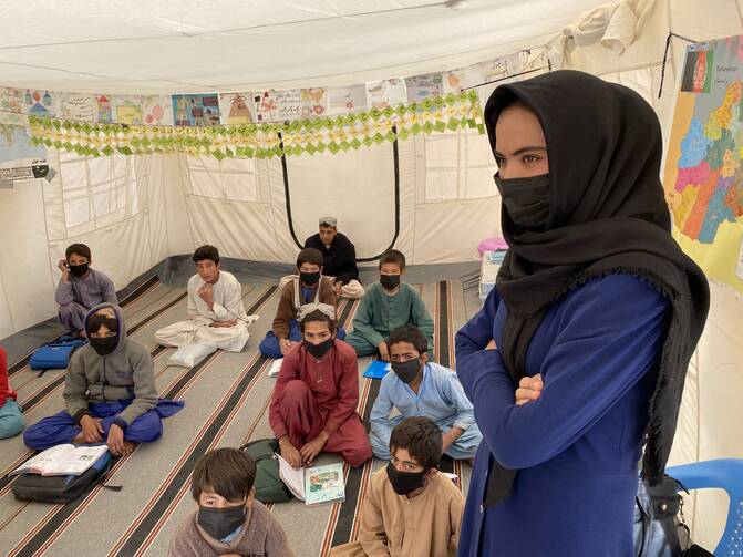 Children attend a Catholic Relief Services school in a camp for displaced people on the outskirts of Herat. Photo courtesy of Kevin Hartigan/Catholic Relief Services.