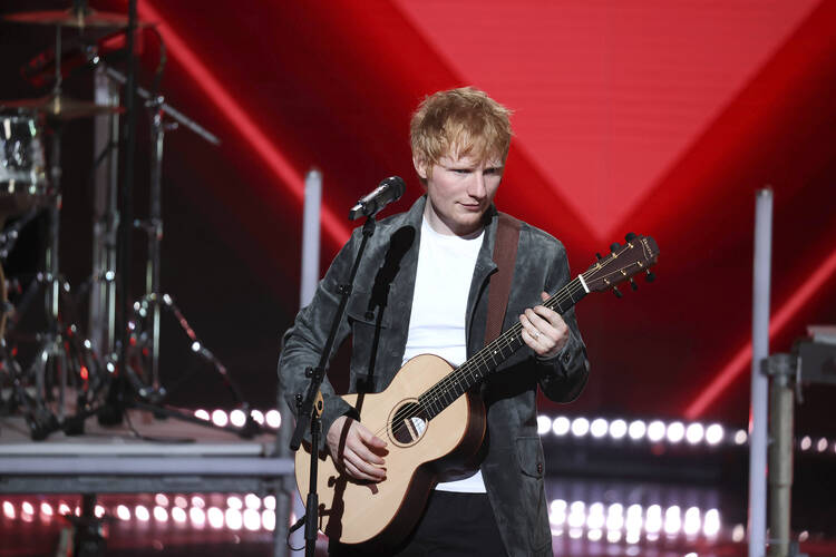 Ed Sheeran performs at the 23th NRJ Music Awards ceremony in Cannes, in the south of France, Nov. 20, 2021. (Sipa via AP Images)