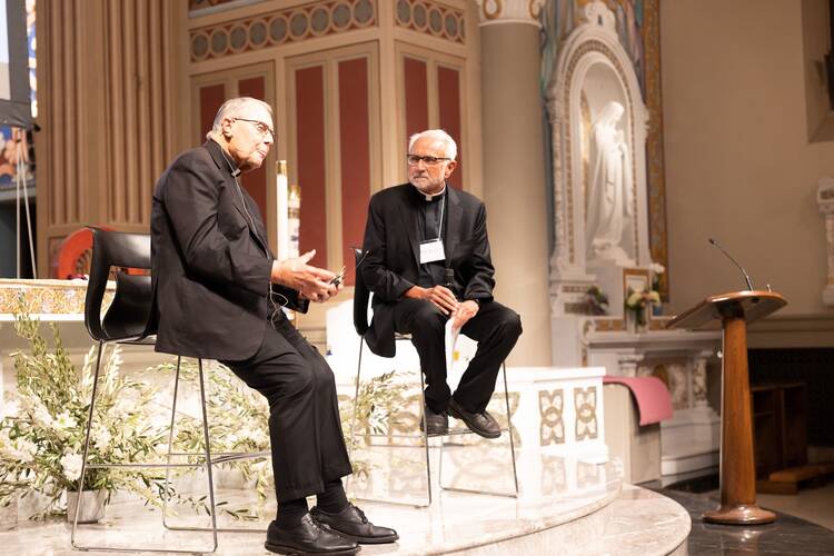Msgr. Lloyd Torgerson and Father Mike Russo at the August premiere of ‘On the Journey’ (photo courtesy Sunday to Sunday)