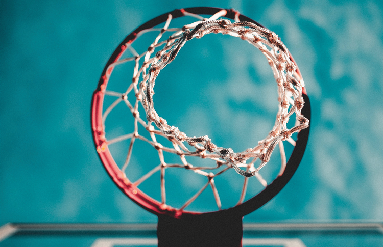 A basketball net photographed from below.