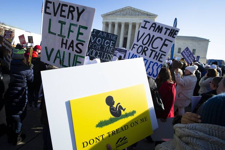 Pro-life advocates are seen near the U.S. Supreme Court Dec. 1, 2021.