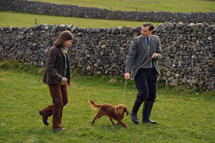 Jenny Alderson (Imogen Clawson), Scruff, Jenny’s dog, and James Herriot (Nicholas Ralph) in “All Things Great and Small” (photo: Playground Television Ltd.)