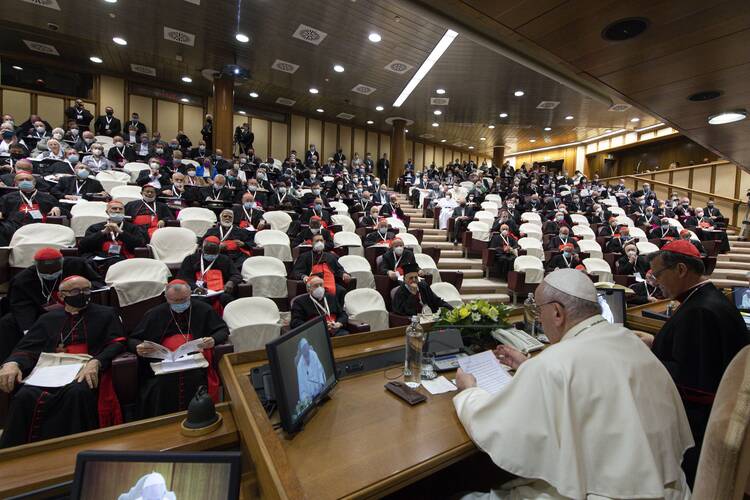 Pope Francis leads a meeting with representatives of bishops' conferences from around the world at the Vatican on Oct. 9, 2021. The meeting came as the Vatican launched the process that will lead up to the assembly of the world Synod of Bishops in 2023. (CNS photo/Paul Haring)