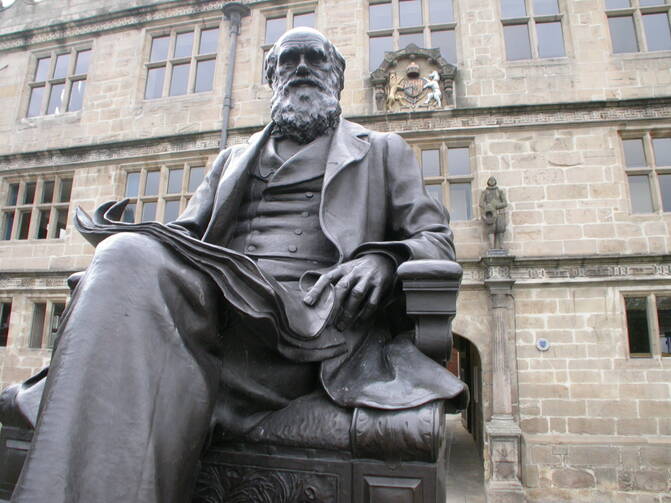 A statue of Charles Darwin at his former school, which is now Shrewsbury Library in the United Kingdom (iStock)