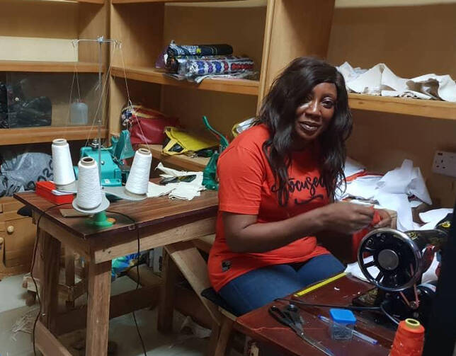 Former inmate Lucy Dangana joins in a tailoring training workshop in Abuja, Nigeria's capital in 2021. Photo courtesy of Capio.