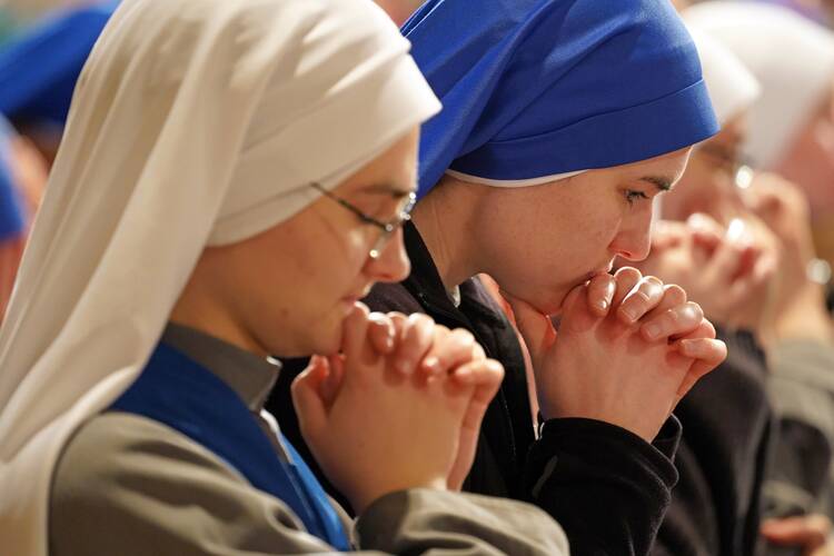 Women religious pray during the opening Mass of the National Prayer Vigil for Life at the Basilica of the National Shrine of the Immaculate Conception in Washington on Jan. 23, 2020. On Feb. 1, 2022, Pope Francis offered his prayer intention for the month of February, which he dedicated to religious and consecrated women. (CNS photo/Gregory A. Shemitz)