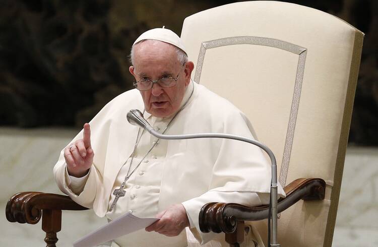Pope Francis speaks during his general audience in the Paul VI hall at the Vatican on March 23, 2022.