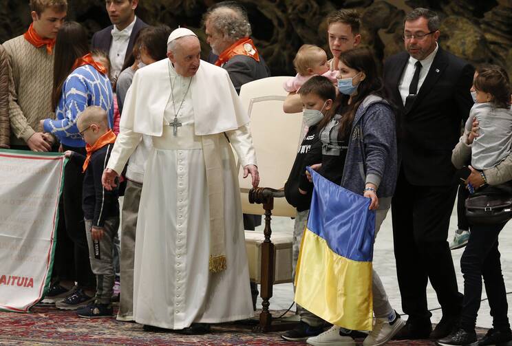 Pope Francis meets refugees from Ukraine during his general audience in the Paul VI Hall at the Vatican on March 30, 2022.  (CNS photo/Paul Haring)