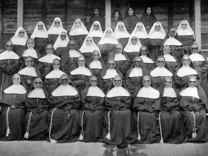 This 1898 photo provided by the Sisters of the Holy Family (SSF) shows members of the religious order of African-American nuns in New Orleans.